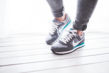 Healthy legs with grey and light blue shoes